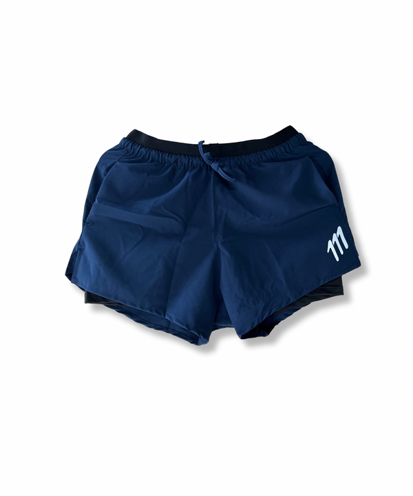 Pantaloneta de running azul oscuro mujer